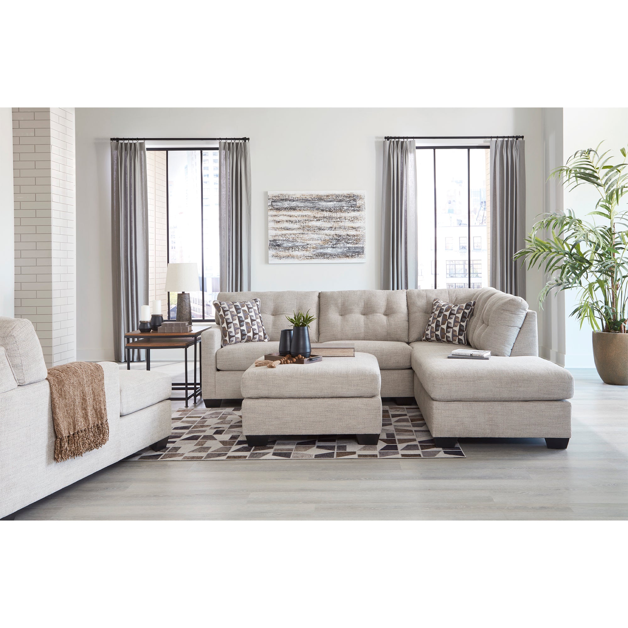 Mahoney 2-Piece Sectional with Chaise, featuring durable pebble upholstery, suitable for Milwaukee family rooms