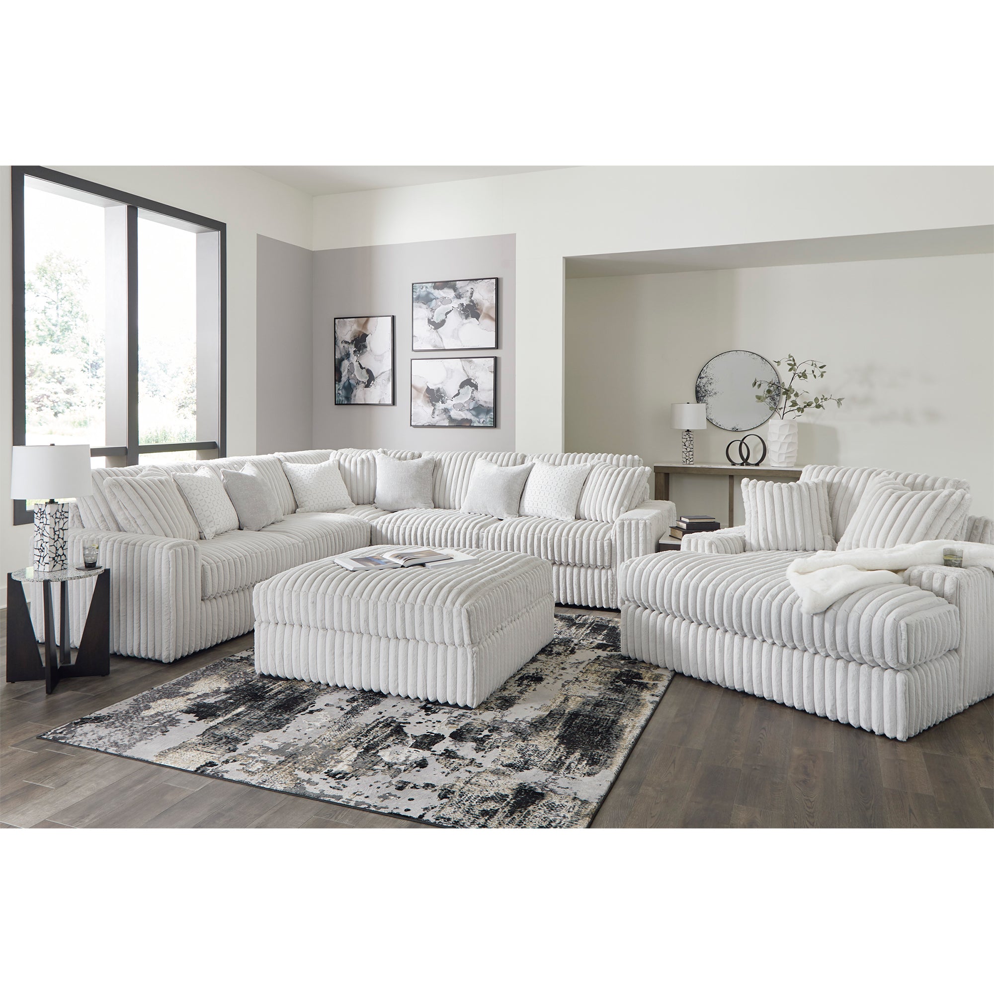 Elegant Stupendous Sectional with loose reversible cushions and plush feather-fiber blend, ideal for cozy living spaces