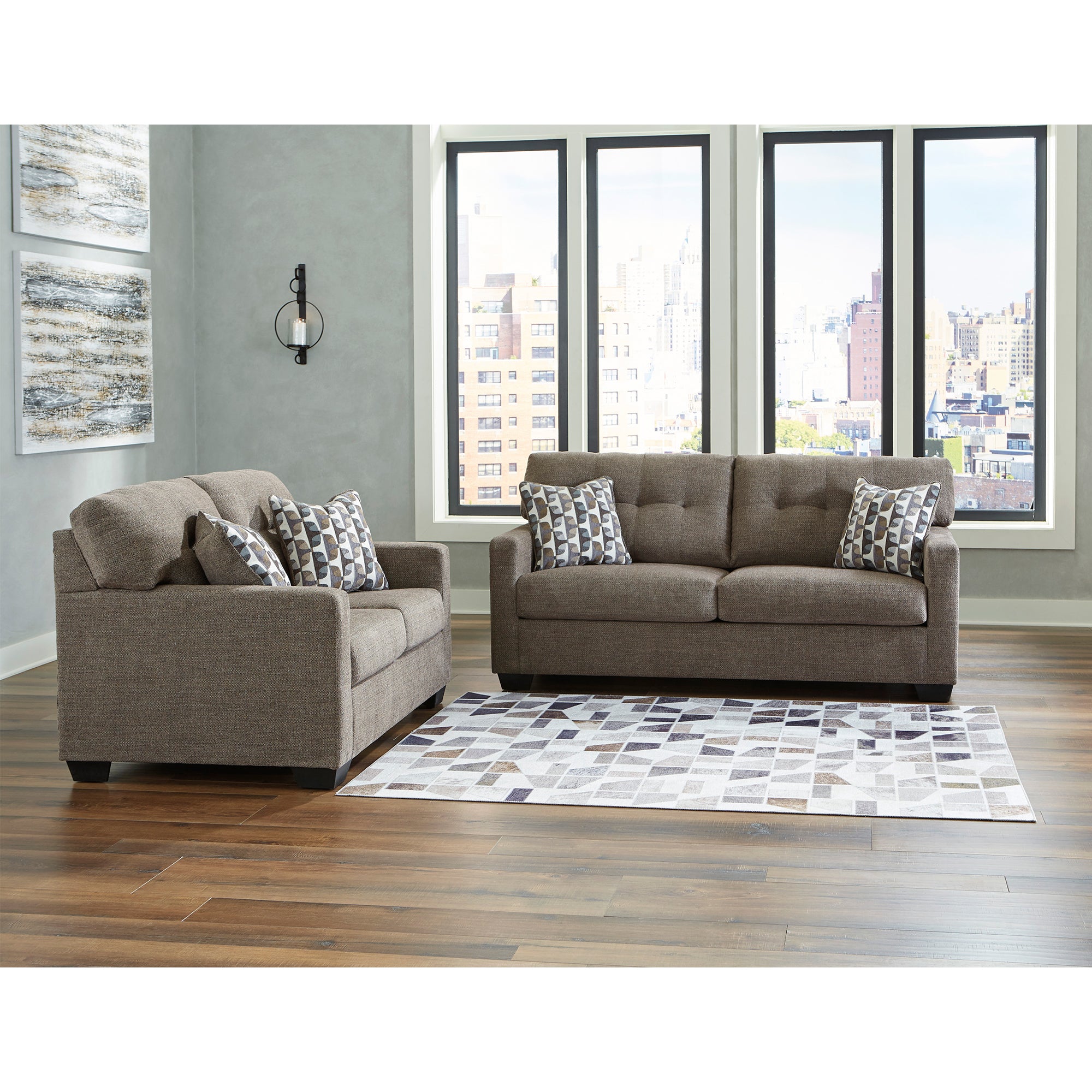 Luxurious chocolate-colored Mahoney Sofa and Loveseat, ideal for comfortable and stylish home interiors