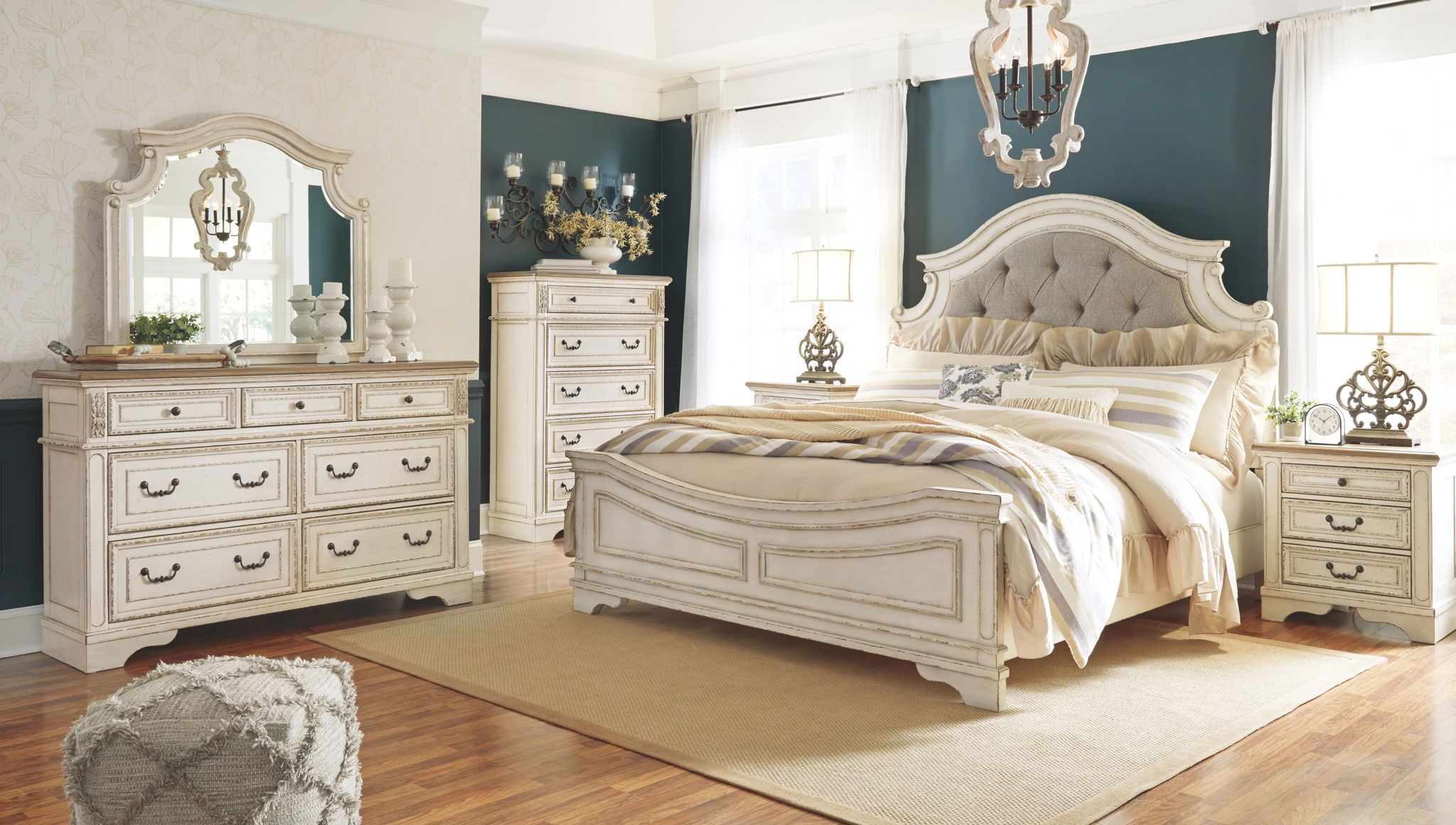 Realyn King Upholstered Panel Bed with Mirrored Dresser